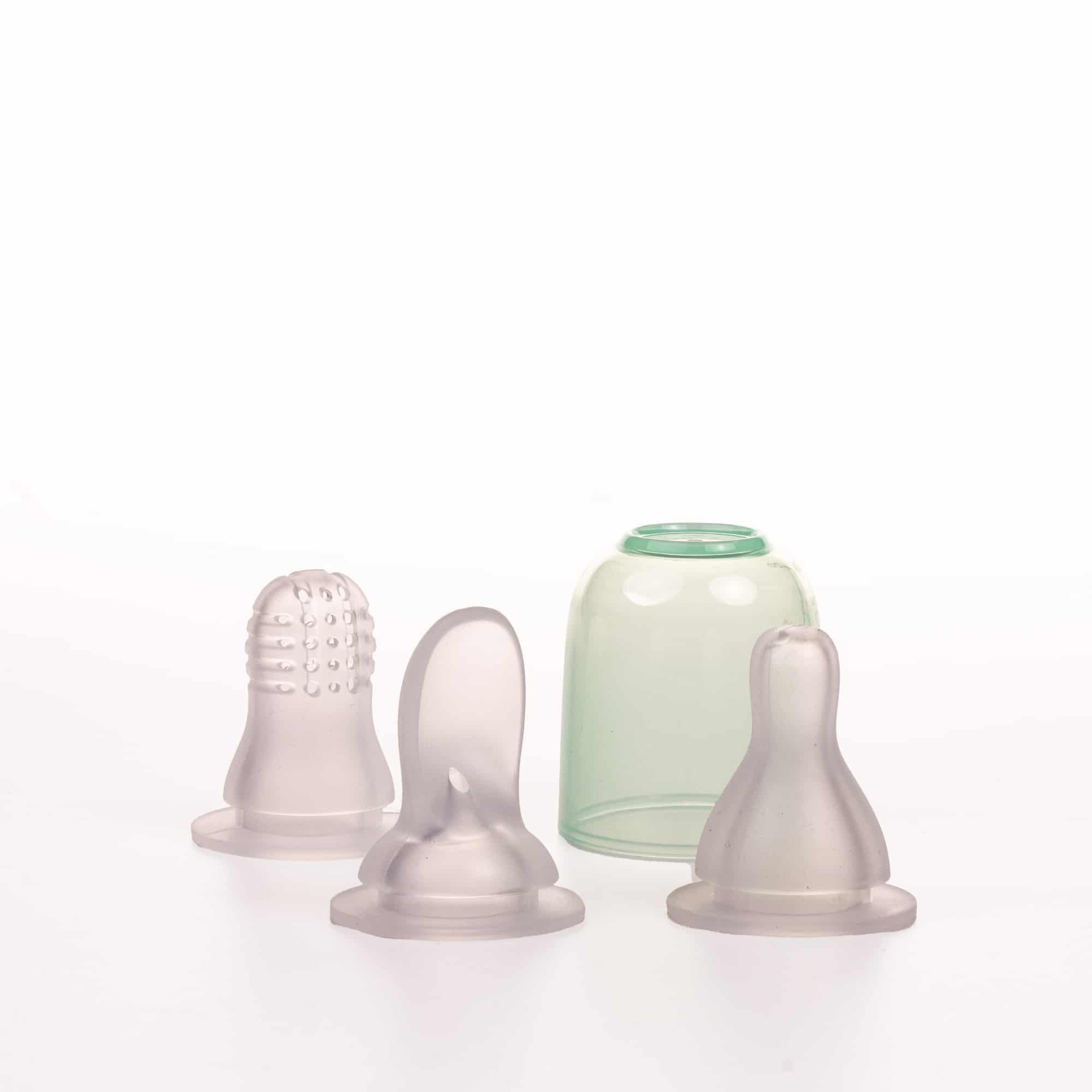 Productfotografie van LEAFFIFY babyfles spenen en een dop op een witte achtergrond. Joep van Drunen Photography
