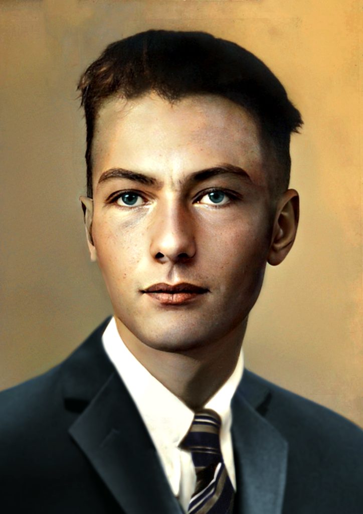 Portret van Karel Jan met blauwe ogen, in pak met stropdas. Jan van Drunen foto. Joep van Drunen Photography